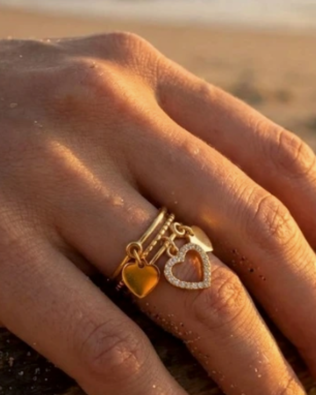 TRIPLE HEARTS CHARM RINGS 928853